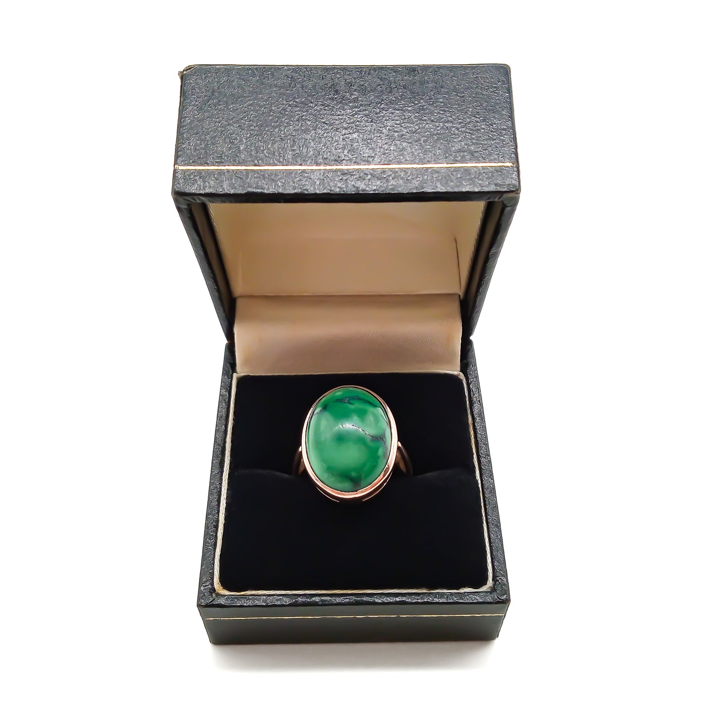 Stylish 9ct rose gold ring set with a beautiful oval cabochon green turquoise stone.