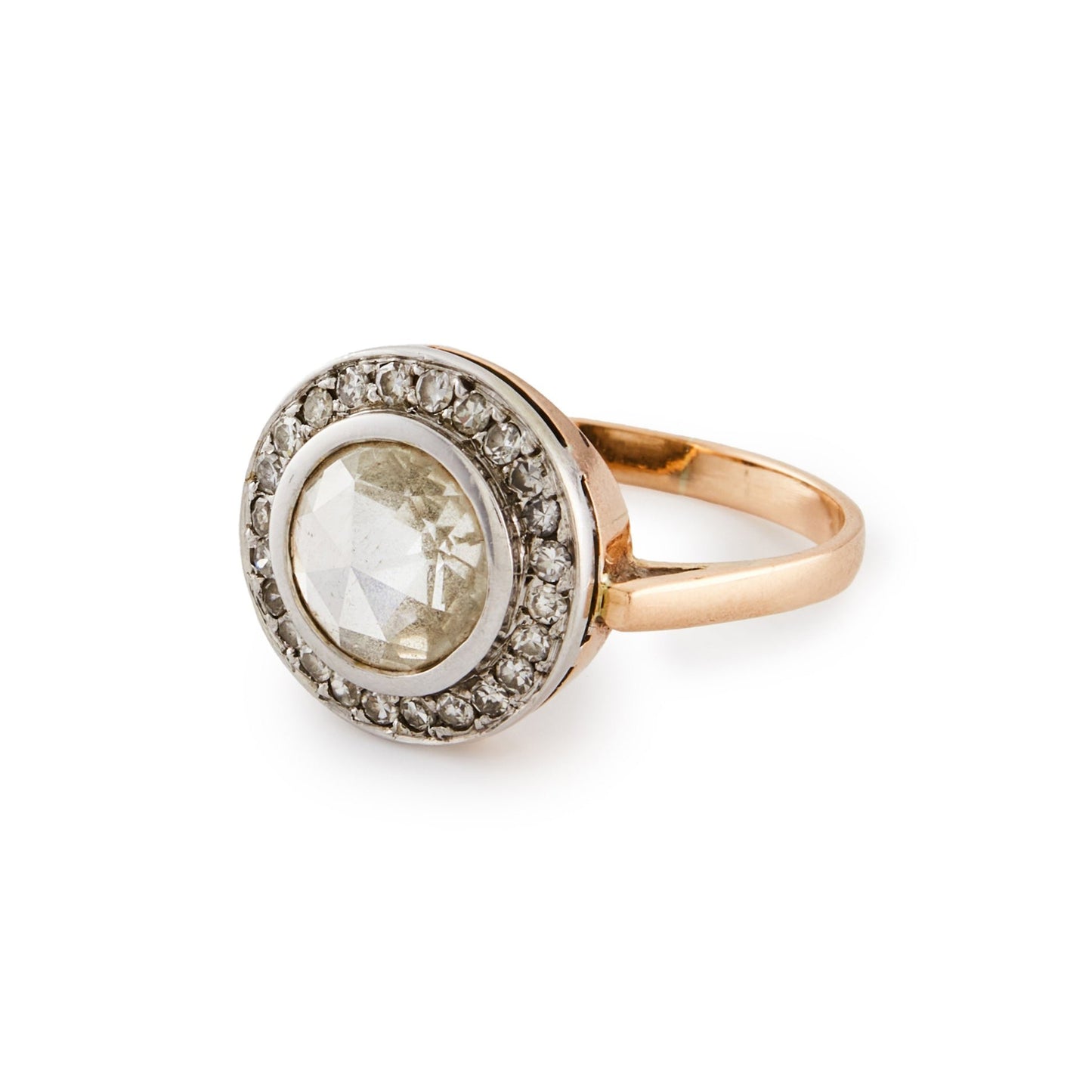 Magnificent 9ct rose gold ring with a 1.3ct rose-cut diamond in a platinum halo setting comprising 24 x 0.02ct diamonds.
