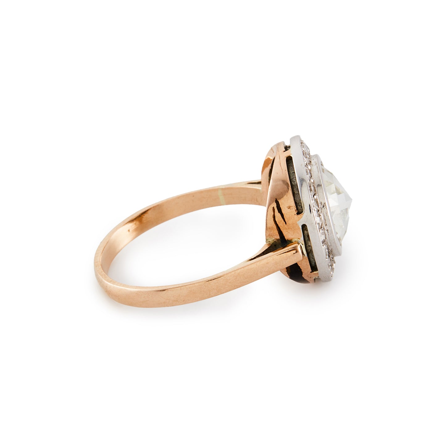Magnificent 9ct rose gold ring with a 1.3ct rose-cut diamond in an 18ct white gold halo setting comprising 24 x 0.02ct diamonds.