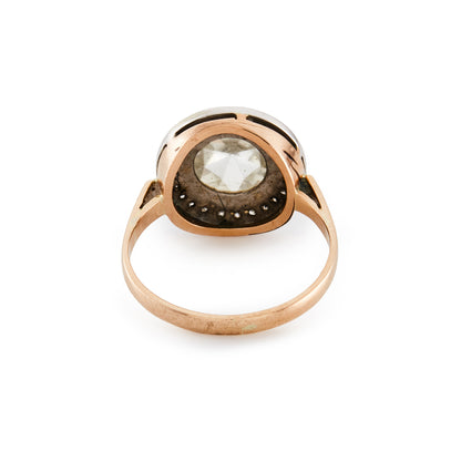 Magnificent 9ct rose gold ring with a 1.3ct rose-cut diamond in an 18ct white gold halo setting comprising 24 x 0.02ct diamonds.