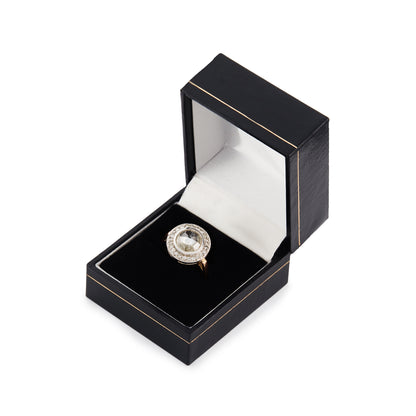 Magnificent 9ct rose gold ring with a 1.3ct rose-cut diamond in an 18ct white gold halo setting comprising 24 x 0.02ct diamonds.
