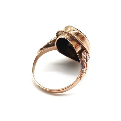 Classic 9ct rose gold and onyx signet ring with a fancy script letter “L”, containing a small diamond.