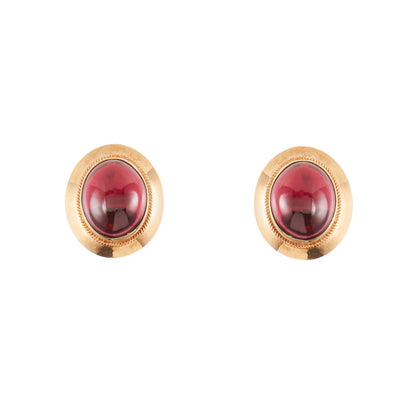 Classic pair of 9ct gold stud earrings, each set with a lovely deep red cabochon garnet.