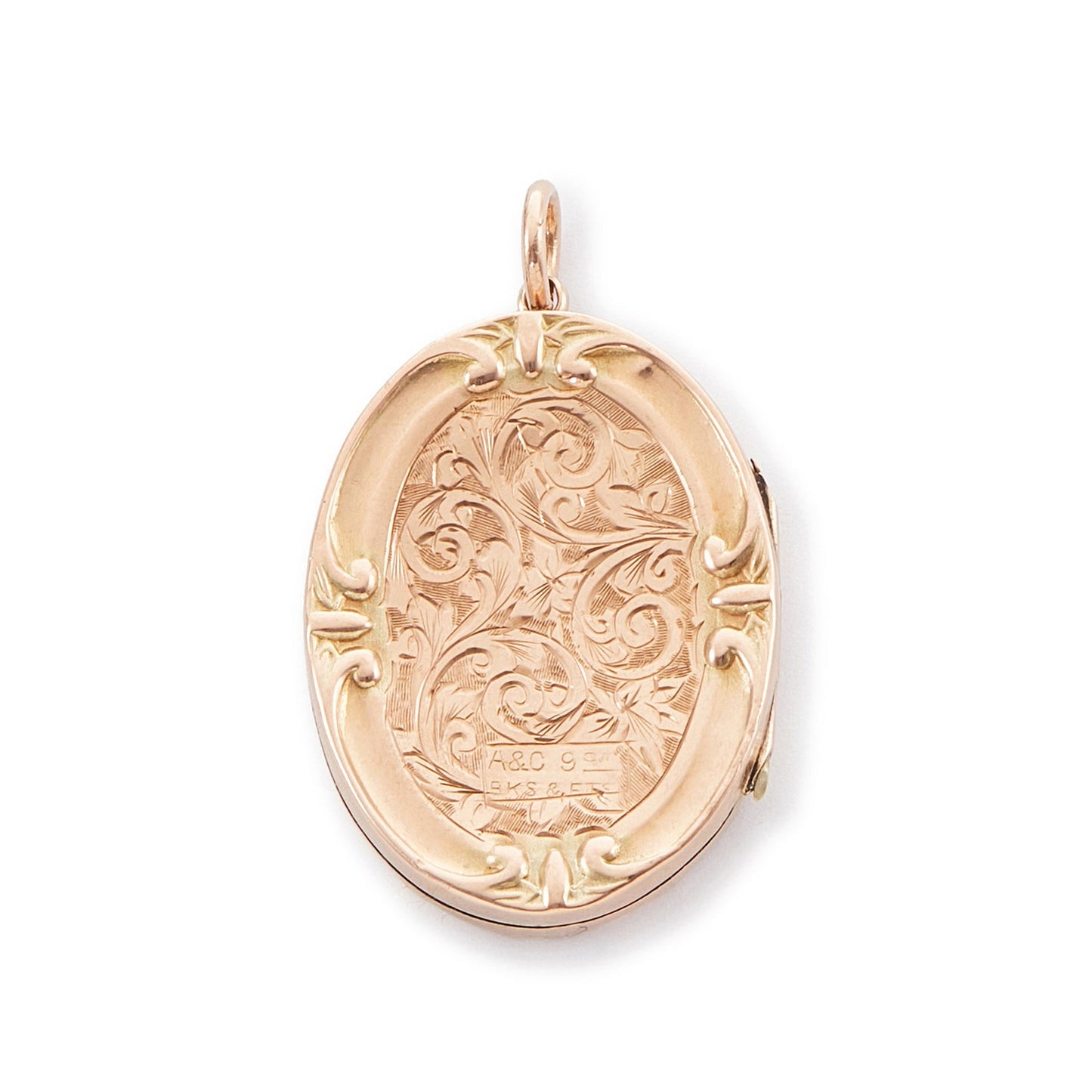Beautiful 9ct rose gold oval shaped back and front locket with ornate engraving. The locket opens to take two photographs. 
Stamped: A&C 9ct BK & FT