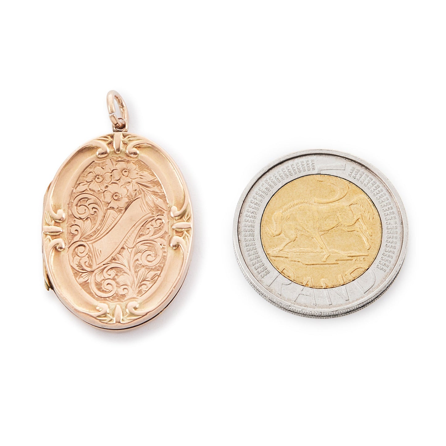 Beautiful 9ct rose gold oval shaped back and front locket with ornate engraving. The locket opens to take two photographs. 
Stamped: A&C 9ct BK & FT