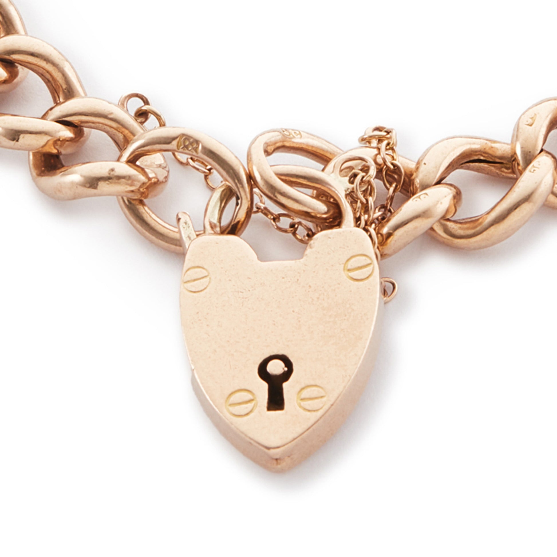 Classic Victorian 9ct rose gold curb link bracelet with a padlock and safety chain.