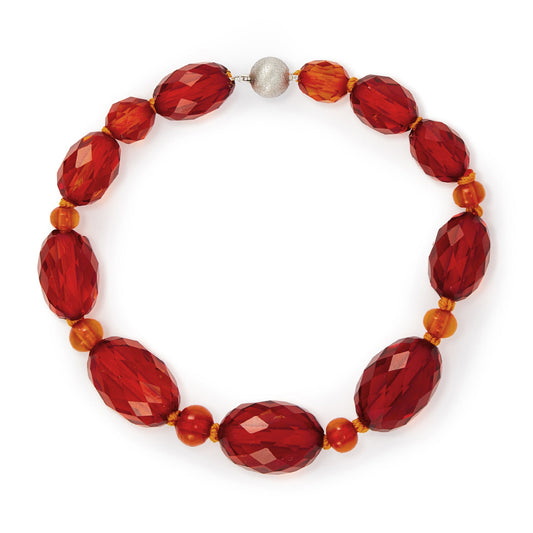 Lovely vintage faceted baltic amber bracelet with a cognac hue and silver ball clasp.