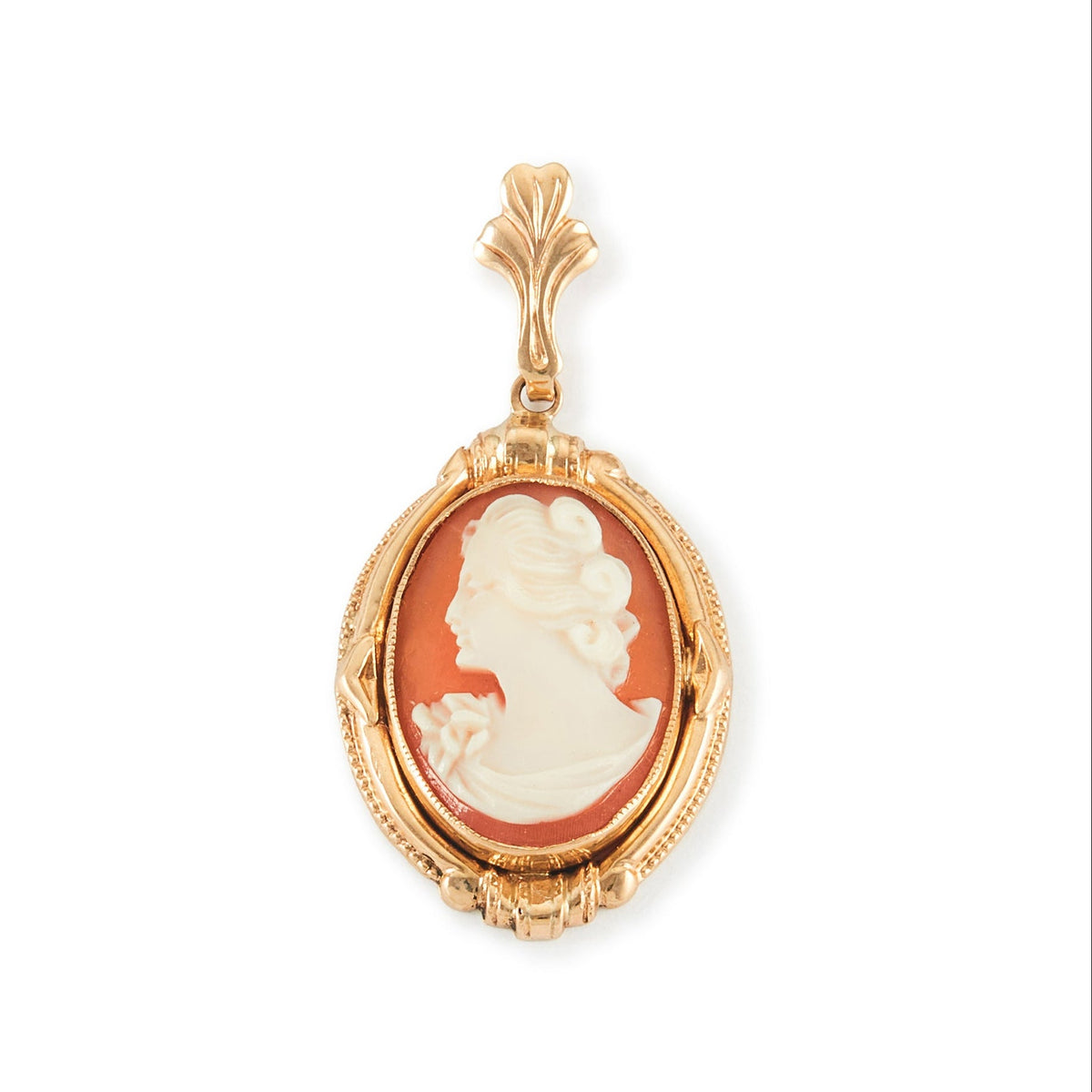 Lovely 10ct gold pendant set with a beautifully carved cameo depicting a silhouette of a lady.
New York. Circa 1930s
Hallmarked: ESEMCO