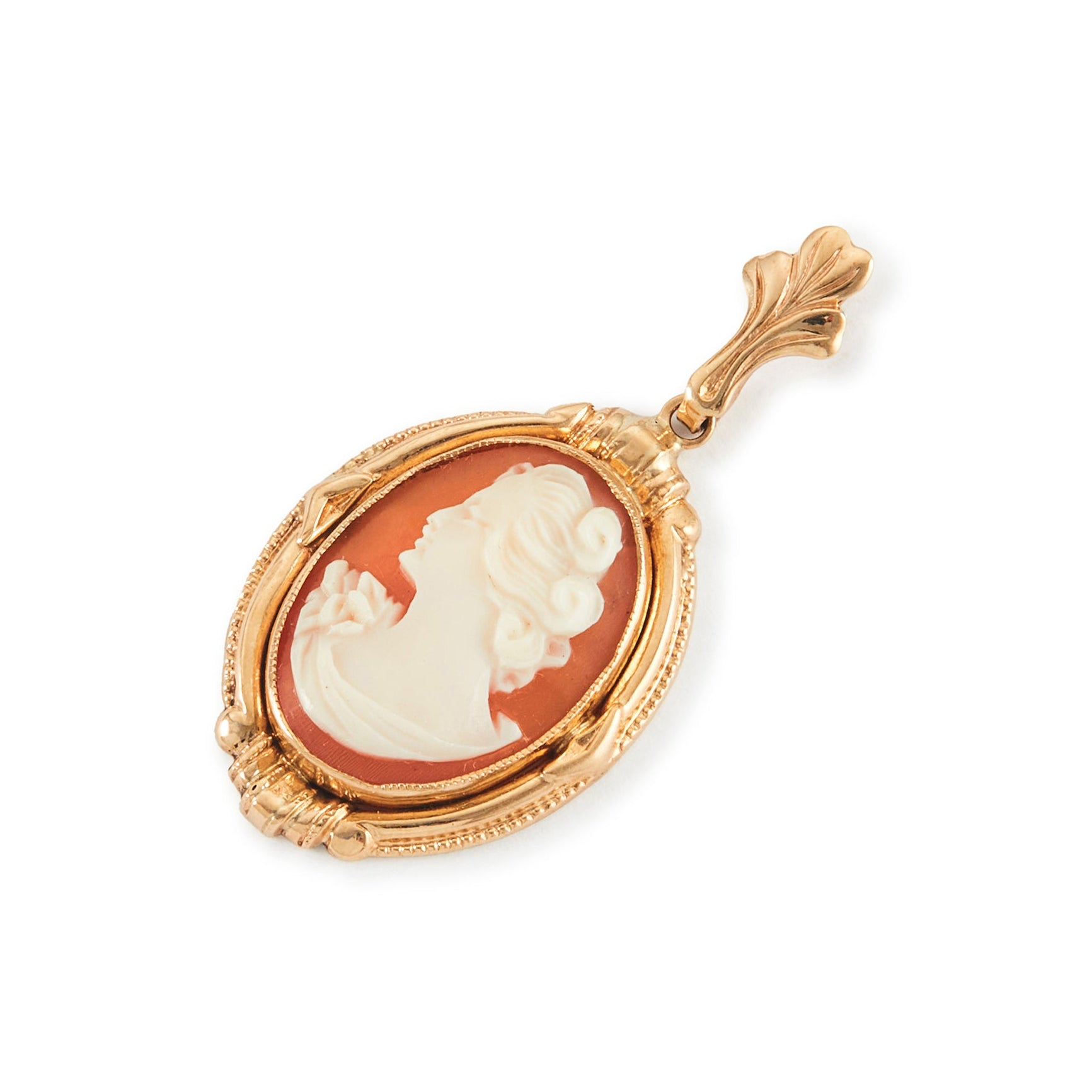 Lovely 10ct gold pendant set with a beautifully carved cameo depicting a silhouette of a lady.
New York. Circa 1930s
Hallmarked: ESEMCO