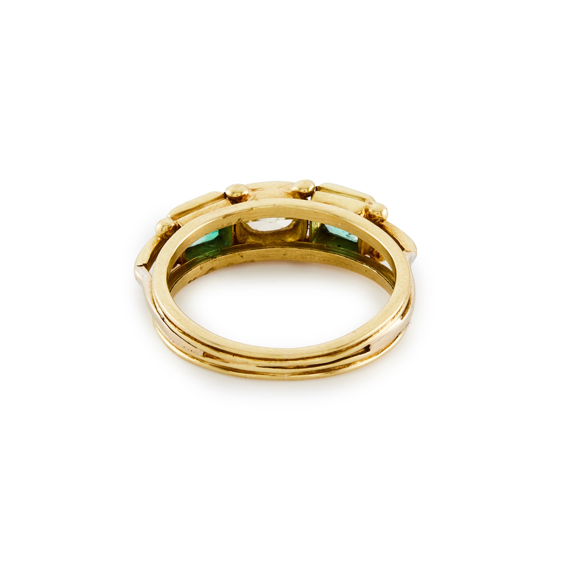 Lovely antique 18ct yellow gold ring, set with a champagne coloured rose cut diamond in the centre and flanked by two bright green emeralds.