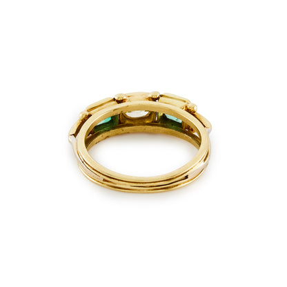 Lovely antique 18ct yellow gold ring, set with a champagne coloured rose cut diamond in the centre and flanked by two bright green emeralds.