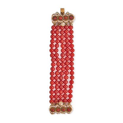 Spectacular antique carnelian five-strand bracelet with a very ornate brass, carnelian and seed pearl clasp. A real statement piece!