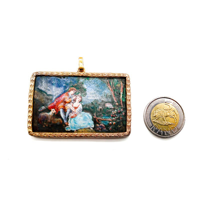 Beautiful enamelled pastoral scene in a gold plated setting.