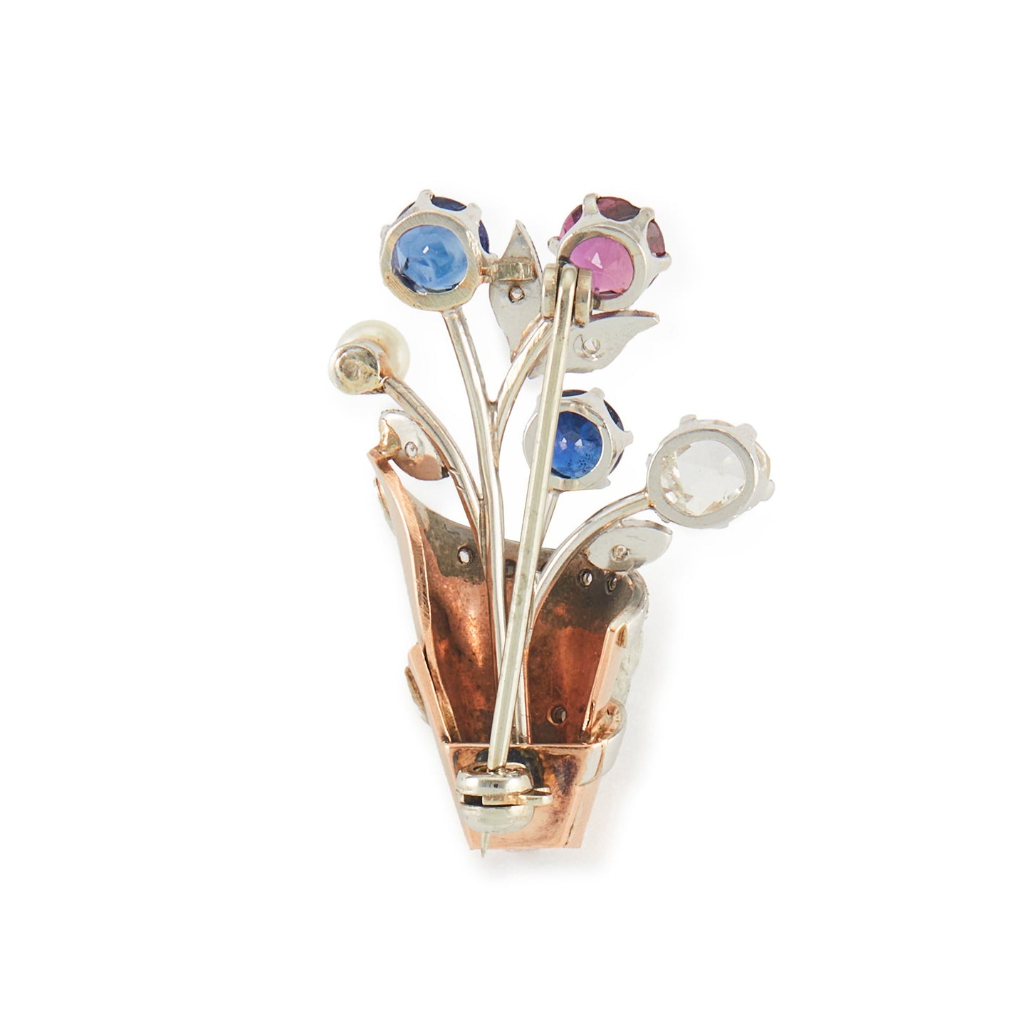 Exquisite 1920s platinum and rose gold brooch set with a deep-red ruby, two sapphires, a natural rose-cut diamond and a pearl. The brooch is also encrusted with eleven small, mine cut diamonds.