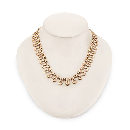 Gorgeous antique repoussé necklace with a generous rose gold layer on a silver backing.