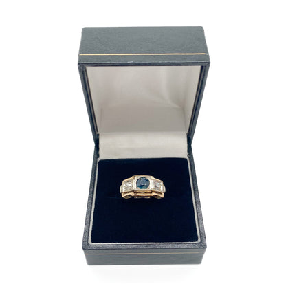 Stylish Art Deco 14ct white and rose gold ring set with a centre 0.50ct sapphire, and a 0.15ct diamond on each side. Lovey engraving on the shoulders. Italy