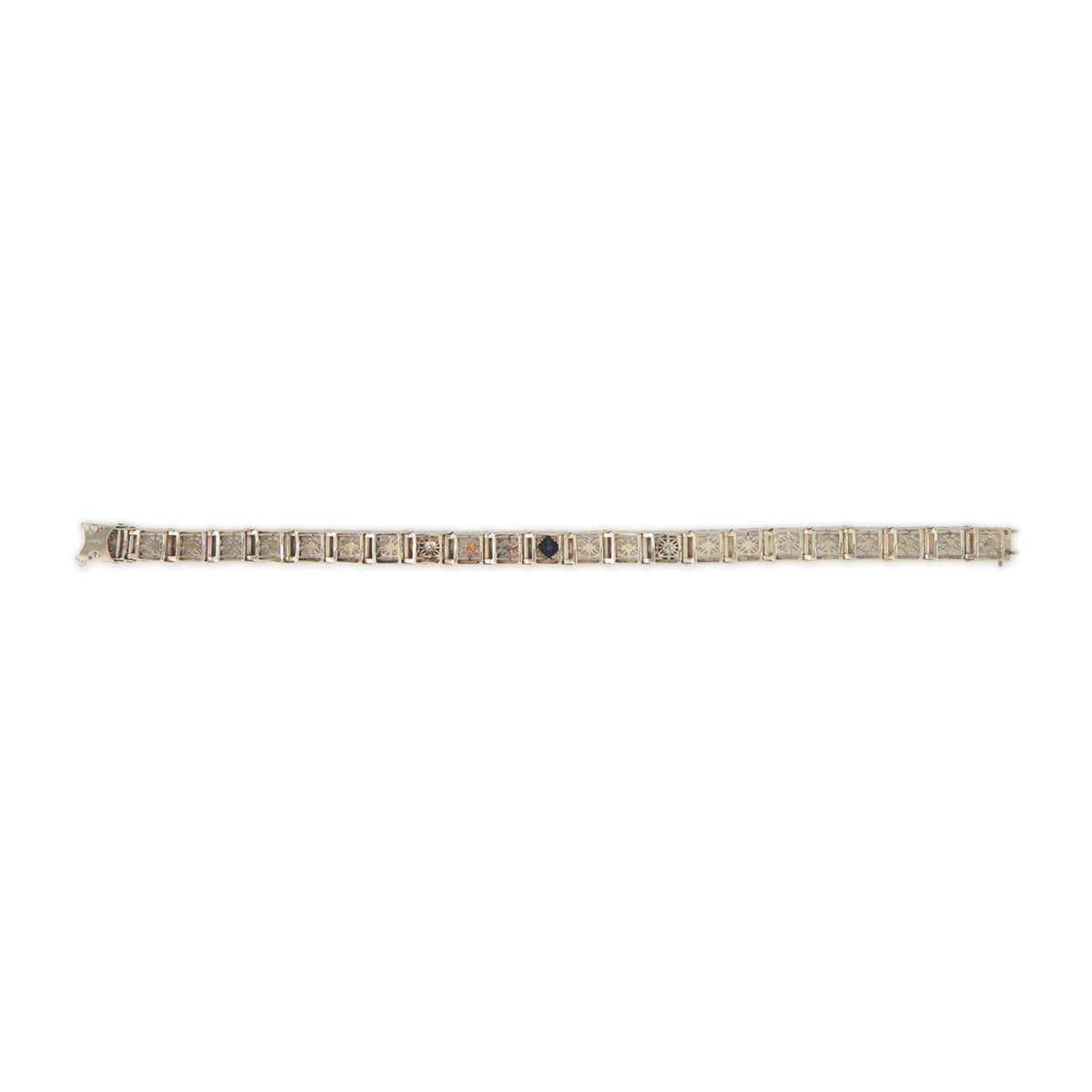 Elegant Art Deco 14ct white gold filigree bracelet set with two round, natural diamonds and a deep-blue sapphire.