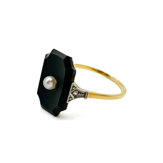 Stylish 18ct gold Art Deco onyx ring set with a single seed pearl and a mine cut diamond on each shoulder.