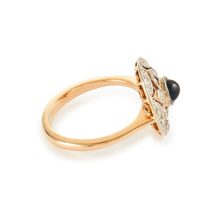 Exquisite Art Deco 18ct yellow and white gold ring set with twenty-one small natural diamonds and a centre deep-green cabochon tourmaline.