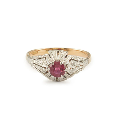 Dainty Art Deco 18ct gold and platinum ring set with an old-cut faceted ruby.