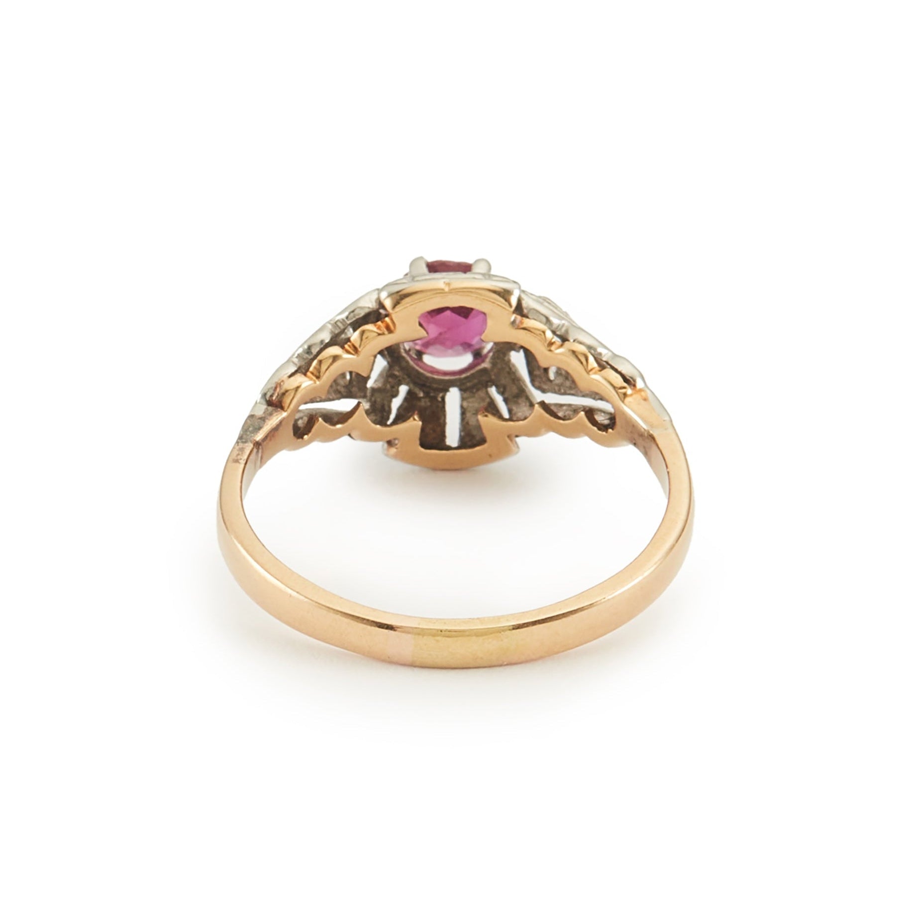 Dainty Art Deco 18ct gold and platinum ring set with an old-cut faceted ruby.