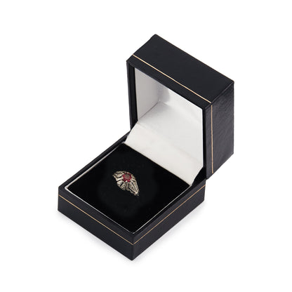 Dainty Art Deco 18ct gold and platinum ring set with an old-cut faceted ruby.