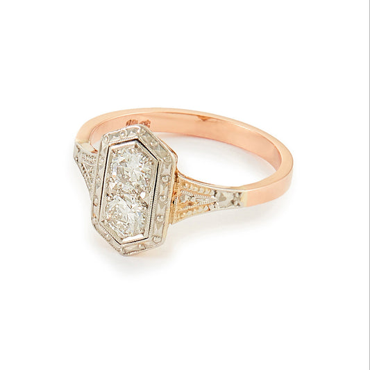 Gorgeous Art Deco 18ct rose gold and platinum ring set with two round 0.20ct sparkling diamonds.