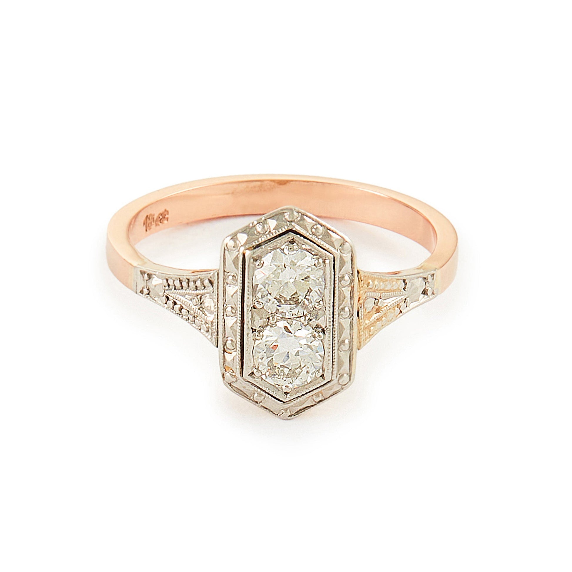 Gorgeous Art Deco 18ct rose gold and platinum ring set with two round 0.20ct sparkling diamonds.