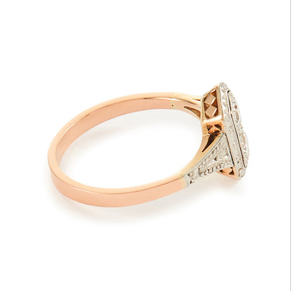 Gorgeous Art Deco 18ct rose gold and platinum ring set with two round 0.20ct sparkling diamonds.