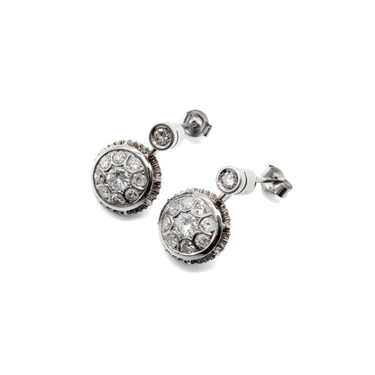 Stunning 18ct white gold Art Deco drop earrings, each set with nine sparkling diamonds.