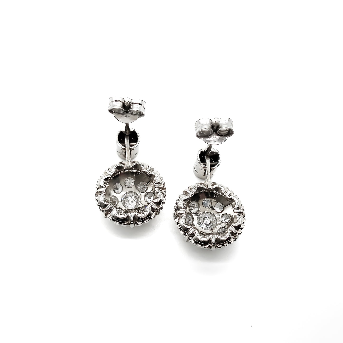 Stunning 18ct white gold Art Deco drop earrings, each set with nine sparkling diamonds.