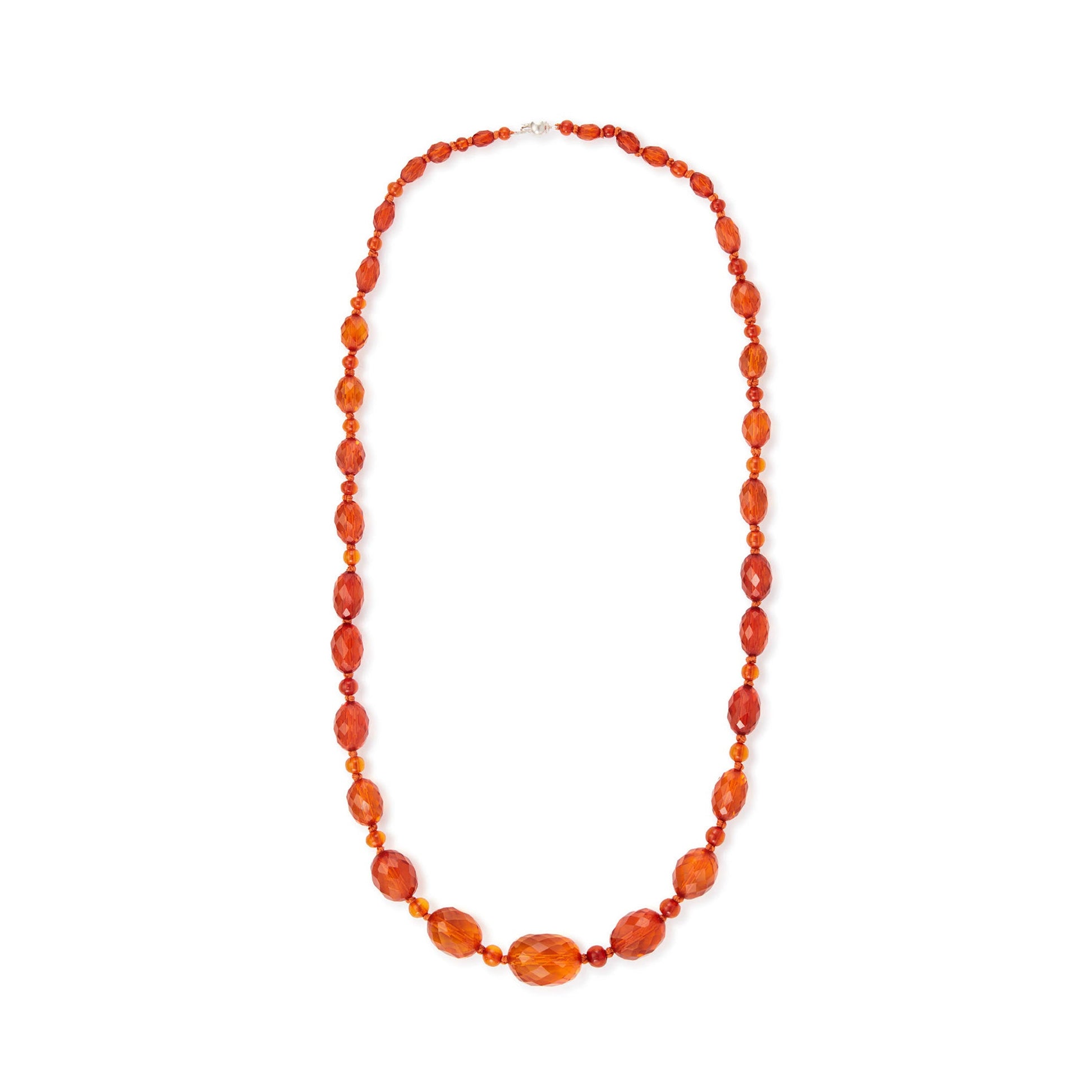 Beautifully faceted Art Deco Baltic amber necklace with an engraved silver clasp. The graduated amber beads have very sought after, varied natural cognac hues.