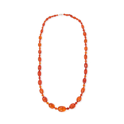 Beautifully faceted Art Deco Baltic amber necklace with an engraved silver clasp. The graduated amber beads have very sought after, varied natural cognac hues.