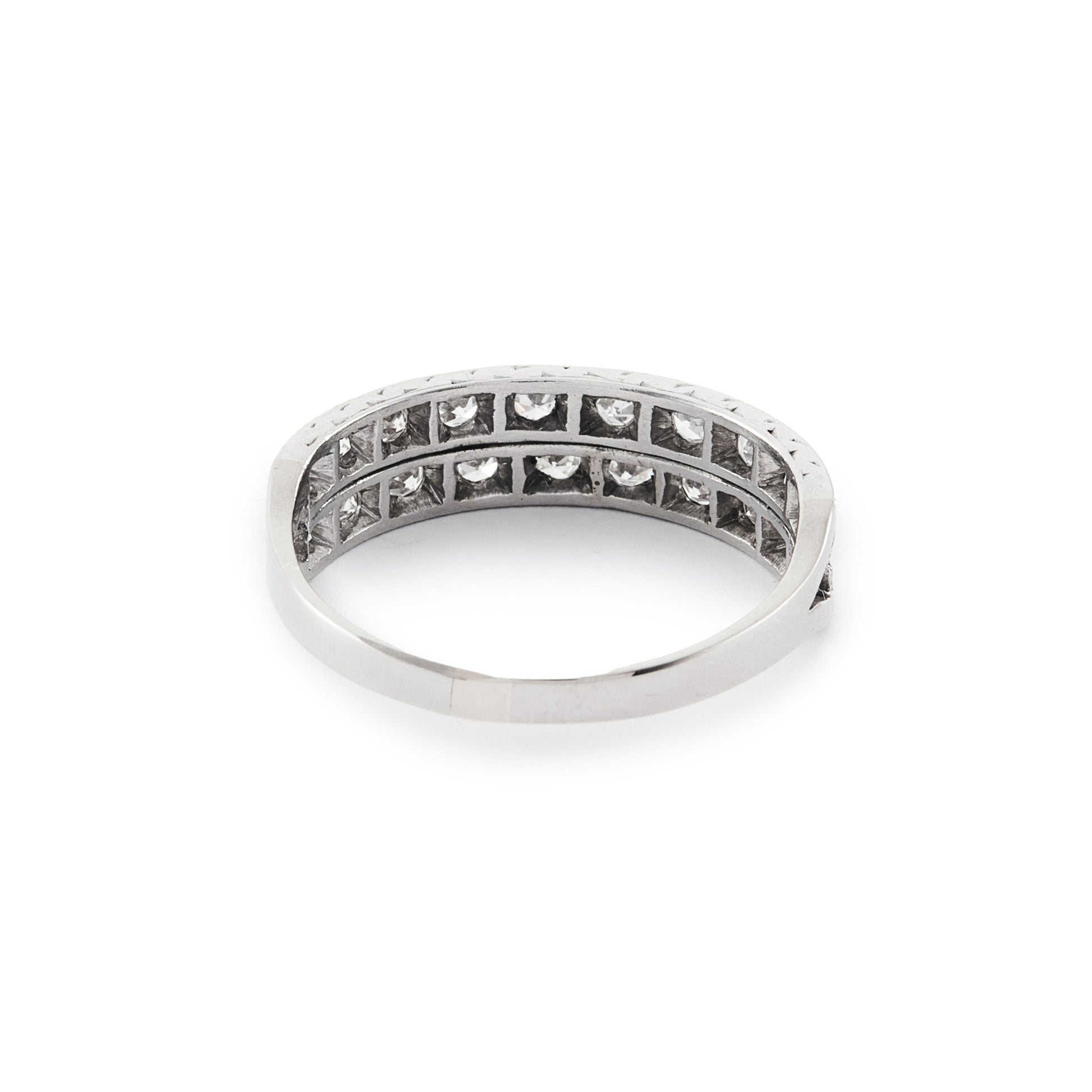 Stylish Art Deco platinum double band half-eternity ring set with twenty 0.05ct diamonds. Circa 1920’s