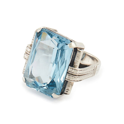 Stunning Art Deco sterling silver ring set with a large, beautifully faceted, sky blue, lab-grown spinel.
Makers mark.