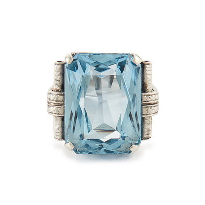 Stunning Art Deco sterling silver ring set with a large, beautifully faceted, sky blue, lab-grown spinel.
Makers mark.