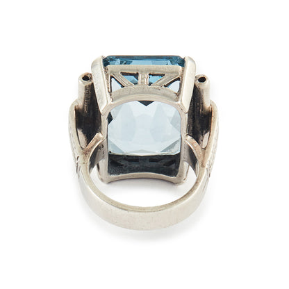 Stunning Art Deco sterling silver ring set with a large, beautifully faceted, sky blue, lab-grown spinel.
Makers mark.
