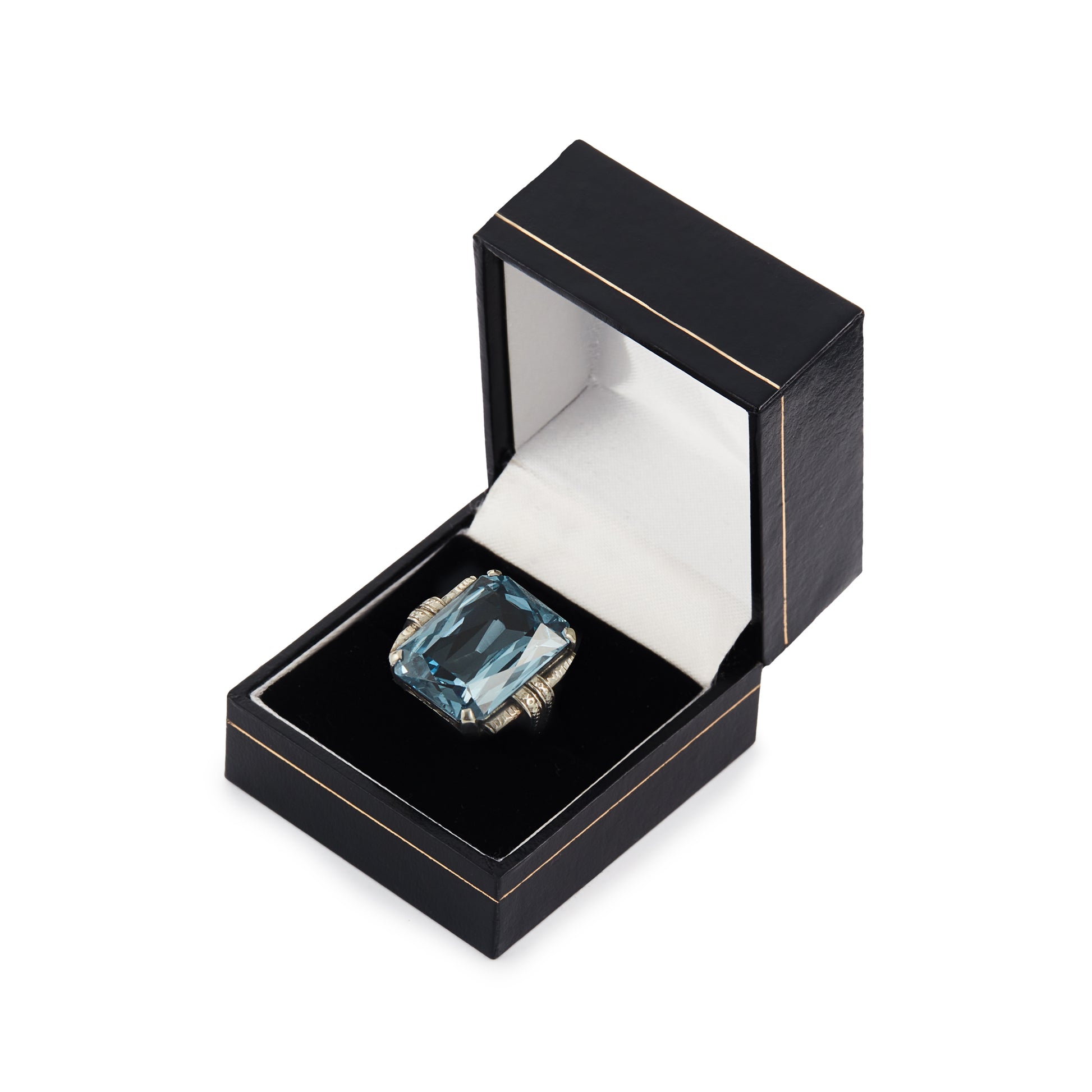 Stunning Art Deco sterling silver ring set with a large, beautifully faceted, sky blue, lab-grown spinel.
Makers mark.