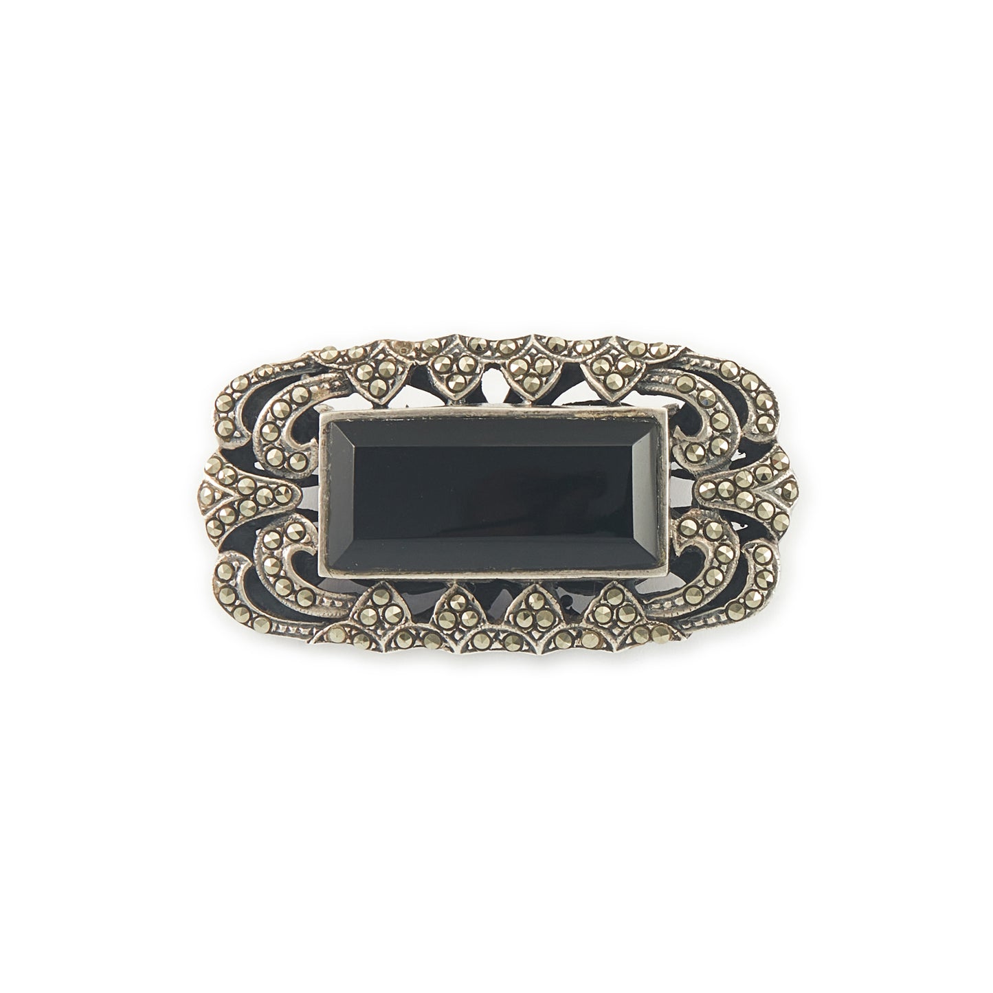 Stylish Art Deco sterling silver marcasite brooch set with a rectangular black onyx stone. Safety clasp.
