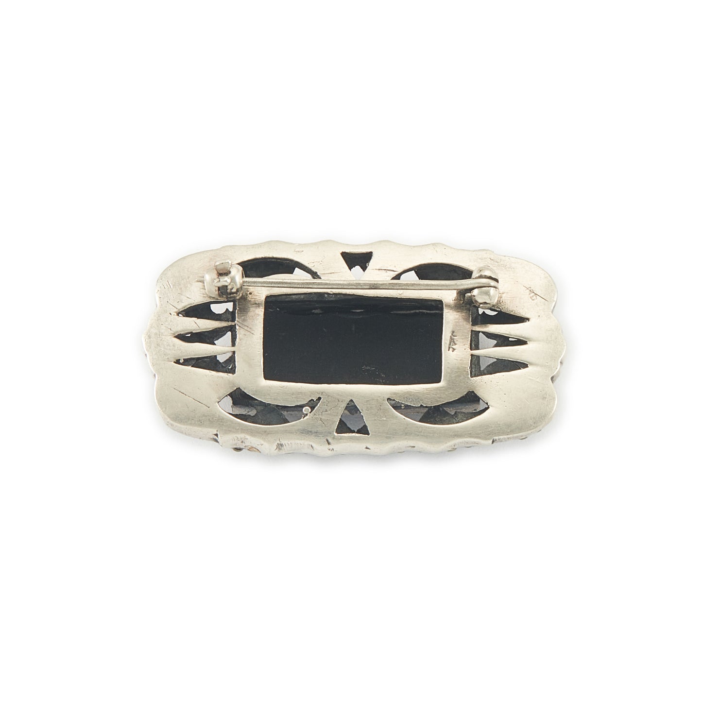 Stylish Art Deco sterling silver marcasite brooch set with a rectangular black onyx stone. Safety clasp.