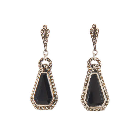 Sterling silver Art Deco marcasite earrings, each set with a faceted onyx stone, surrounded by marcasites.