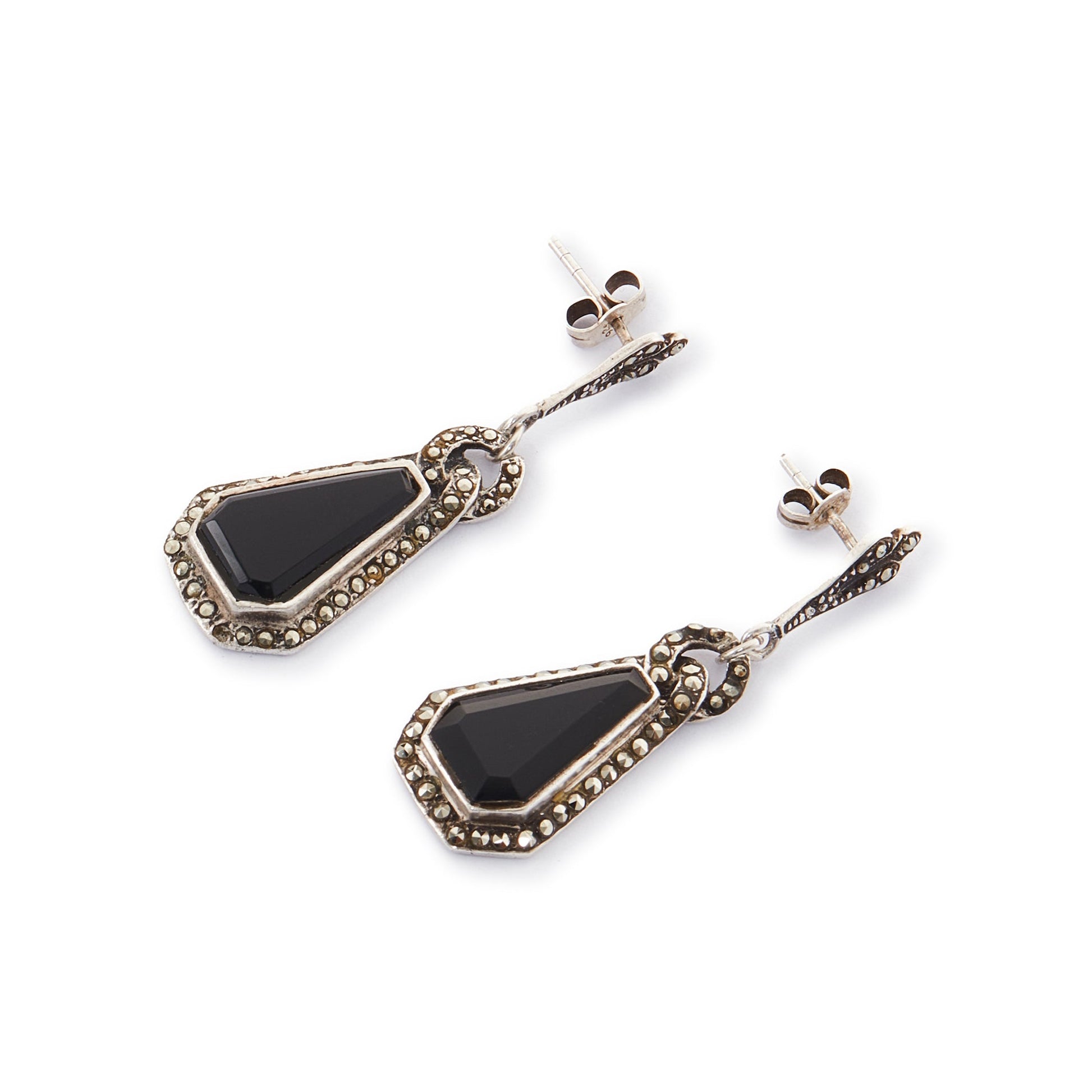 Sterling silver Art Deco marcasite earrings, each set with a faceted onyx stone, surrounded by marcasites.