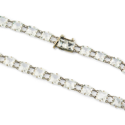 Exquisite Art Deco silver plated necklace set with Austrian crystals. The necklace has a safety clasp. Ideal accessory for a bride or special occasion.