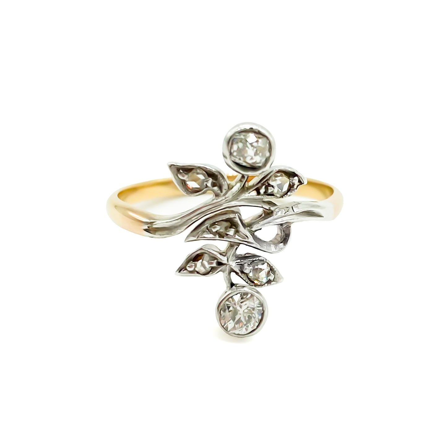 Gorgeous Art Nouveau ring set with seven old-cut diamonds in a floral design. Argentina 