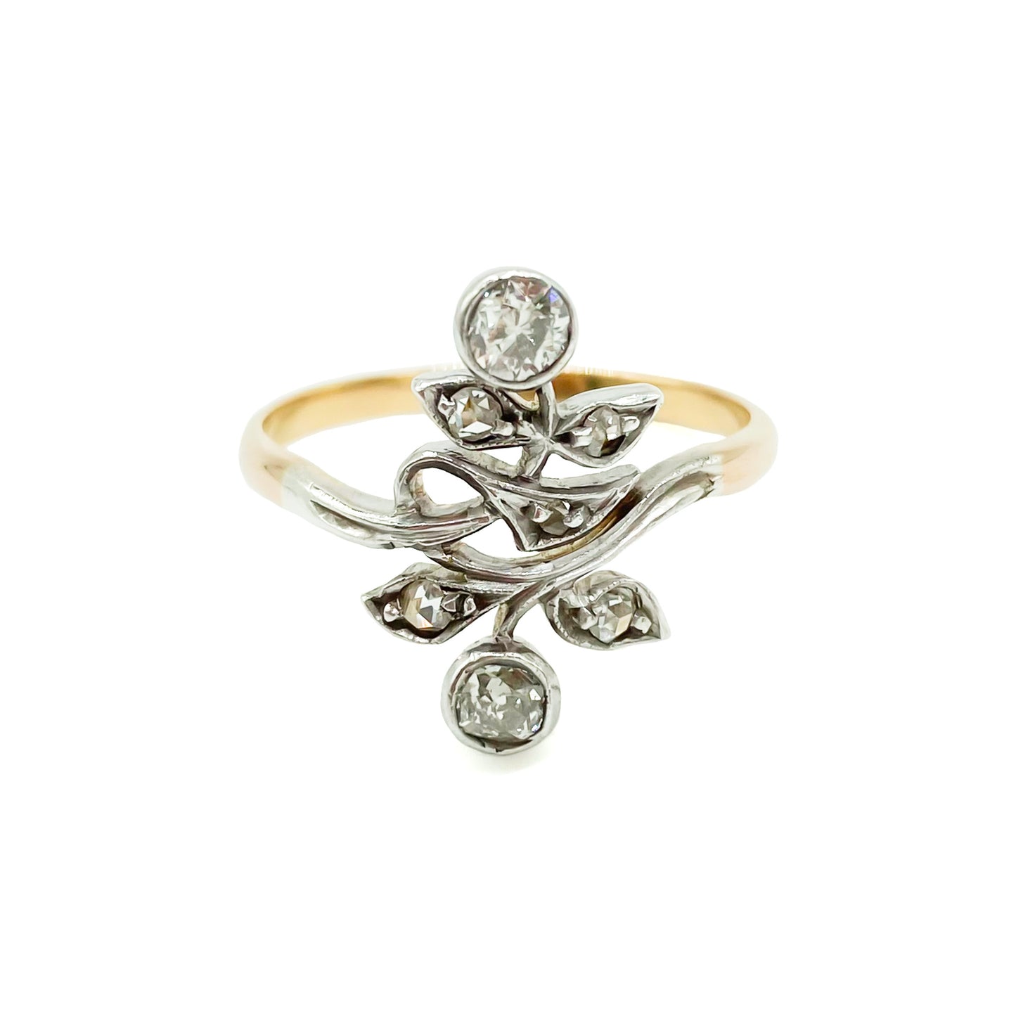 Gorgeous Art Nouveau ring set with seven old-cut diamonds in a floral design. Argentina 