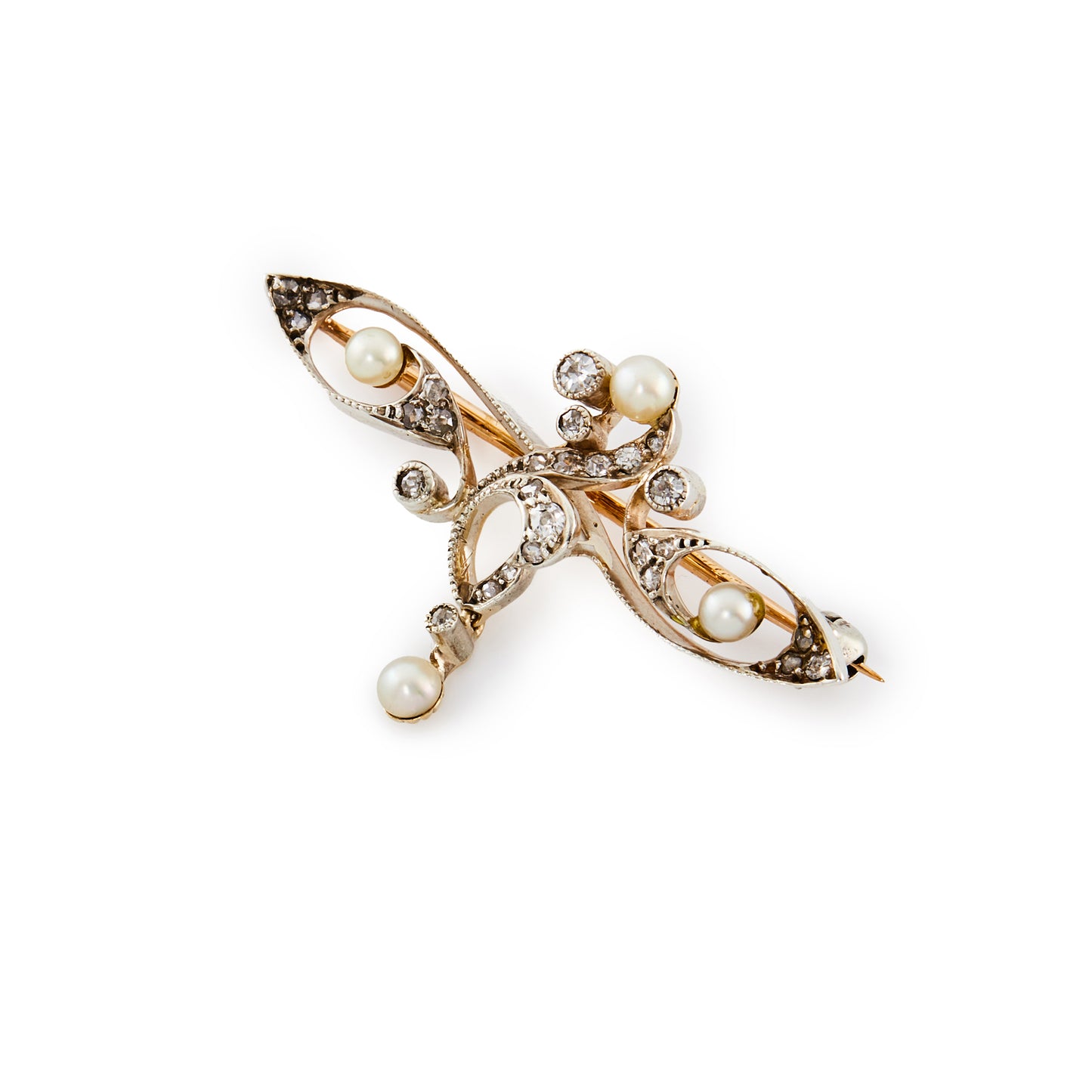 Delicate rose gold and silver Art Nouveau brooch set with old cut diamonds and four small pearls in a free flowing design, with a small diamond and pearl drop.