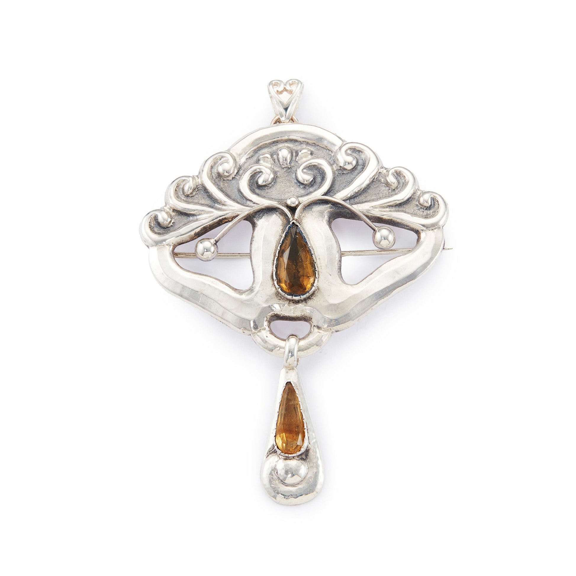 Gorgeous large Art Nouveau repoussé silver and citrine Scandinavian pendant which can also be worn as a brooch. Pin and pendant attachments have been replaced.