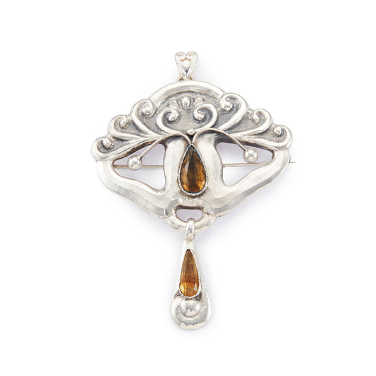Gorgeous large Art Nouveau repoussé silver and citrine Scandinavian pendant which can also be worn as a brooch. Pin and pendant attachments have been replaced.