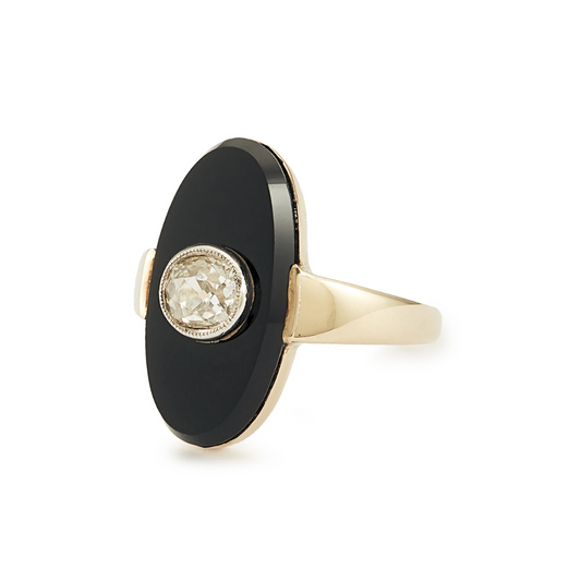 Classic Art Deco 14ct yellow gold ring set with an oval onyx disc, centred by a 0.50ct old-cut diamond.