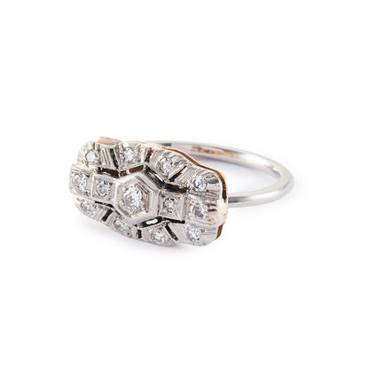 Beautiful Art Deco platinum and 18ct rose gold ring set with thirteen old-cut diamonds in an ornate setting.